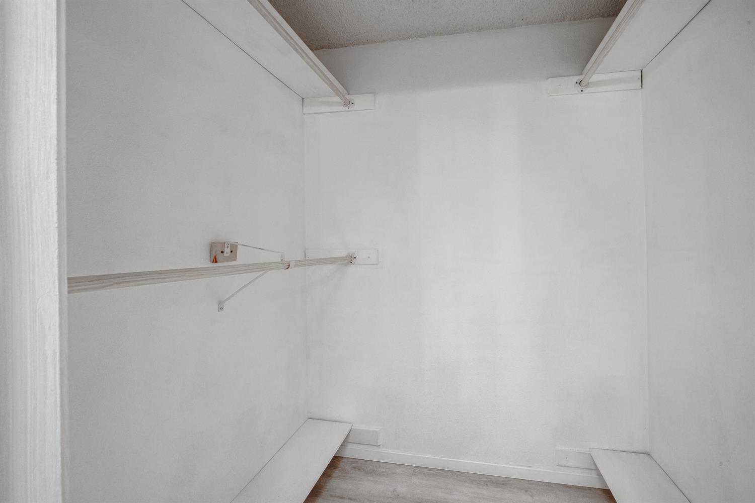 12502 Road 37 1/2 Madera, CA 93636 - Photo 28 of 79 a view of small space with racks on the wall