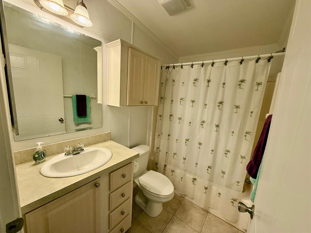 2080 Southwest 85th Avenue Davie, FL 33324 - Photo 10 of 13 a bathroom with a sink toilet and shower