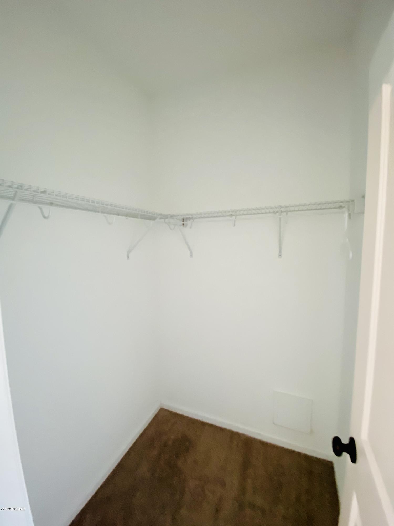 3412 Rounding Bend Drive Winterville, NC 28590 - Photo 15 of 36 First Floor Bedroom walk in closet