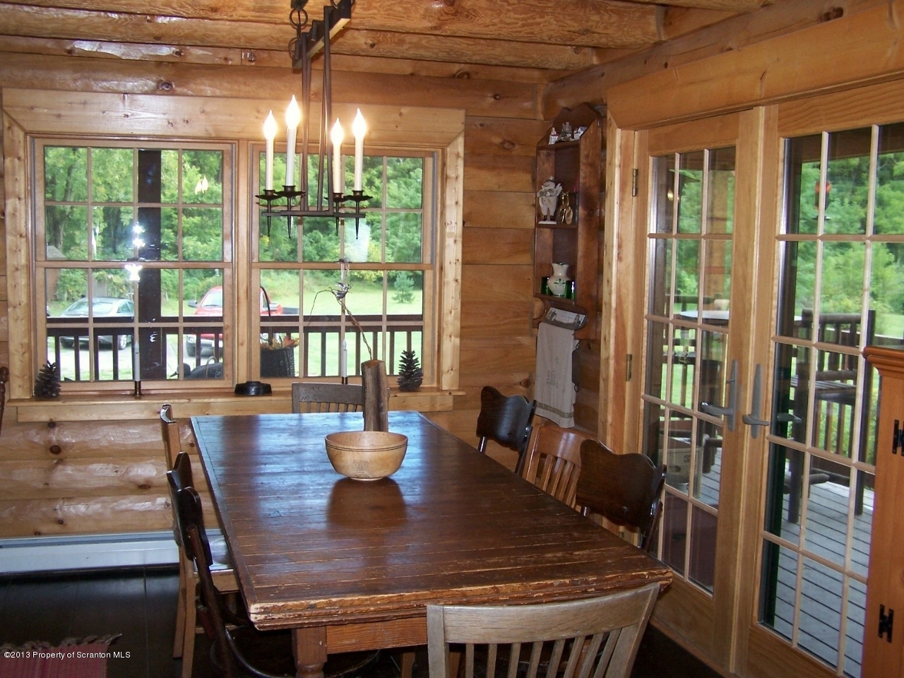 98 Detrick Road Sugar Run, PA 18846 - Photo 20 of 48 a view of a dining room with furniture window and wooden floor