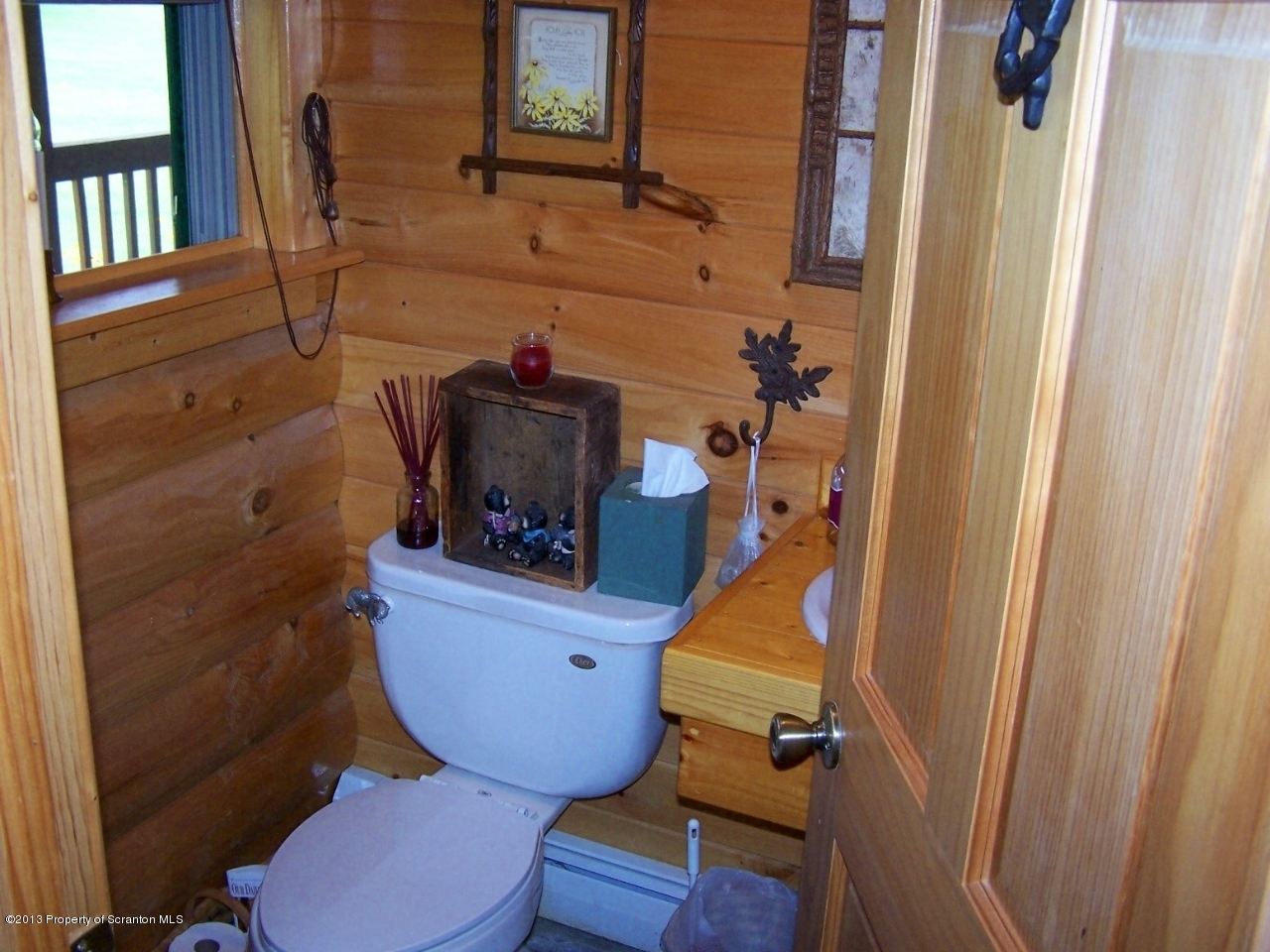 98 Detrick Road Sugar Run, PA 18846 - Photo 21 of 48 a bathroom with a sink and toilet
