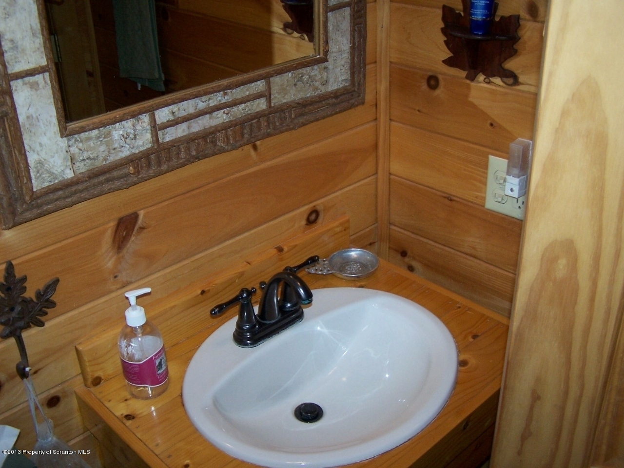 98 Detrick Road Sugar Run, PA 18846 - Photo 22 of 48 a bathroom with a sink