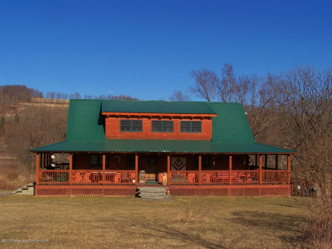 98 Detrick Road Sugar Run, PA 18846 - Photo 3 of 48 a front view of a house with a yard