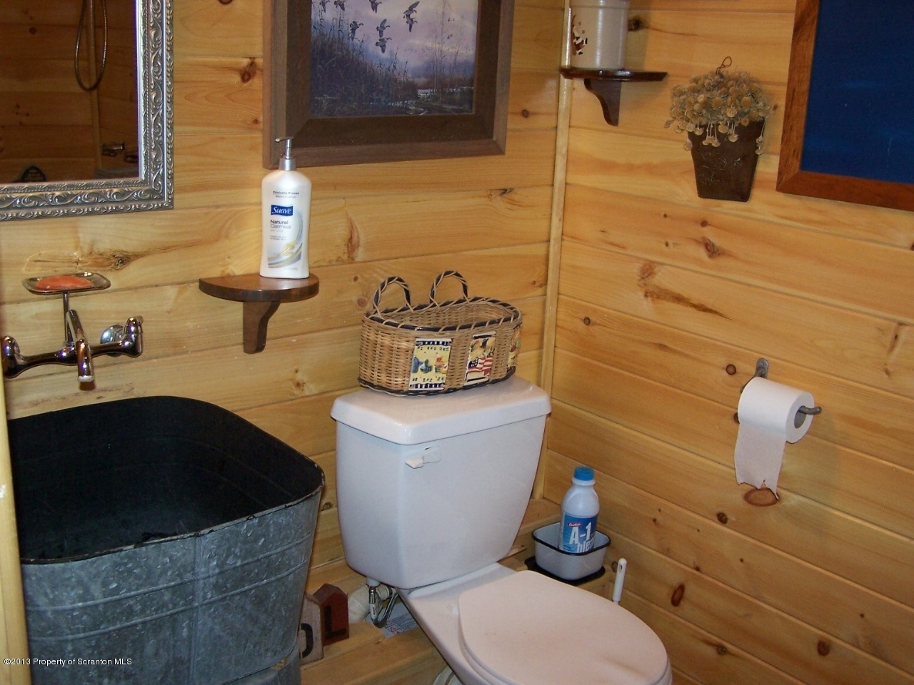 98 Detrick Road Sugar Run, PA 18846 - Photo 39 of 48 a bathroom with a sink and a toilet