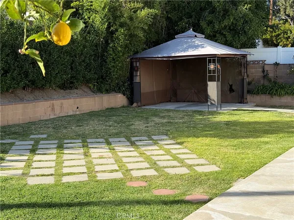 a view of a swimming pool with an outdoor space