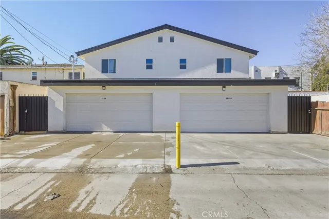 a view of a house with a garage