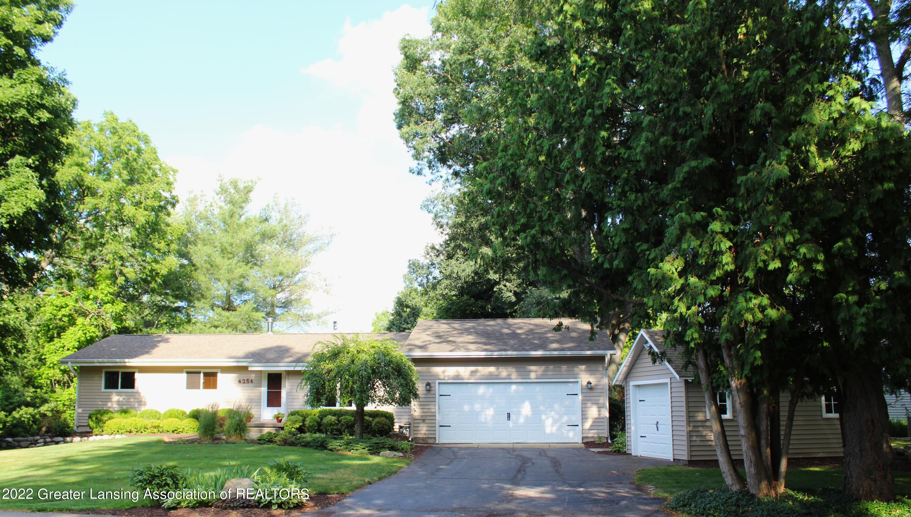 4254 Hulett Road Okemos, MI 48864 - Photo 2 of 43 exterior front (2)