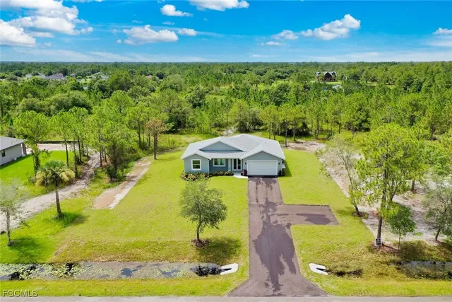 a view of a yard with an outdoor space