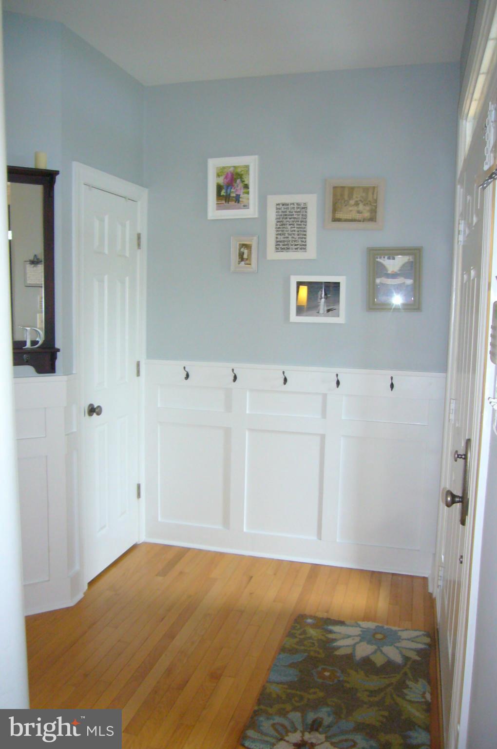 Entrance Foyer with custom wainscoting