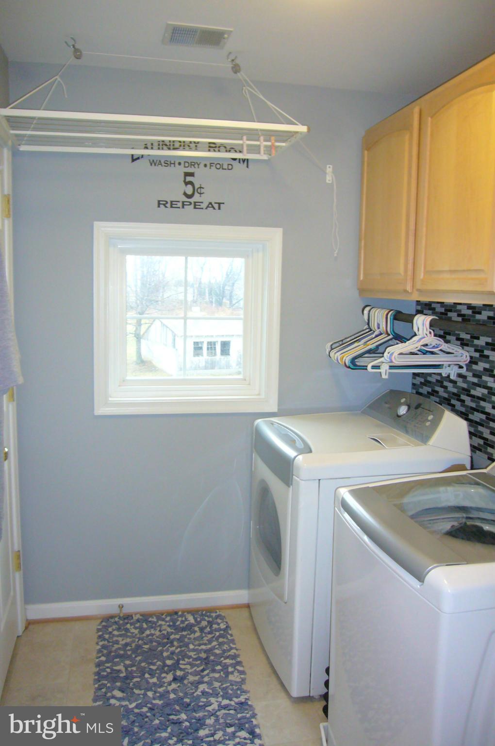 1620 Rising Ridge Road Mount Airy, MD 21771 - Photo 12 of 30 Laundry room w/custom paint & backsplash
