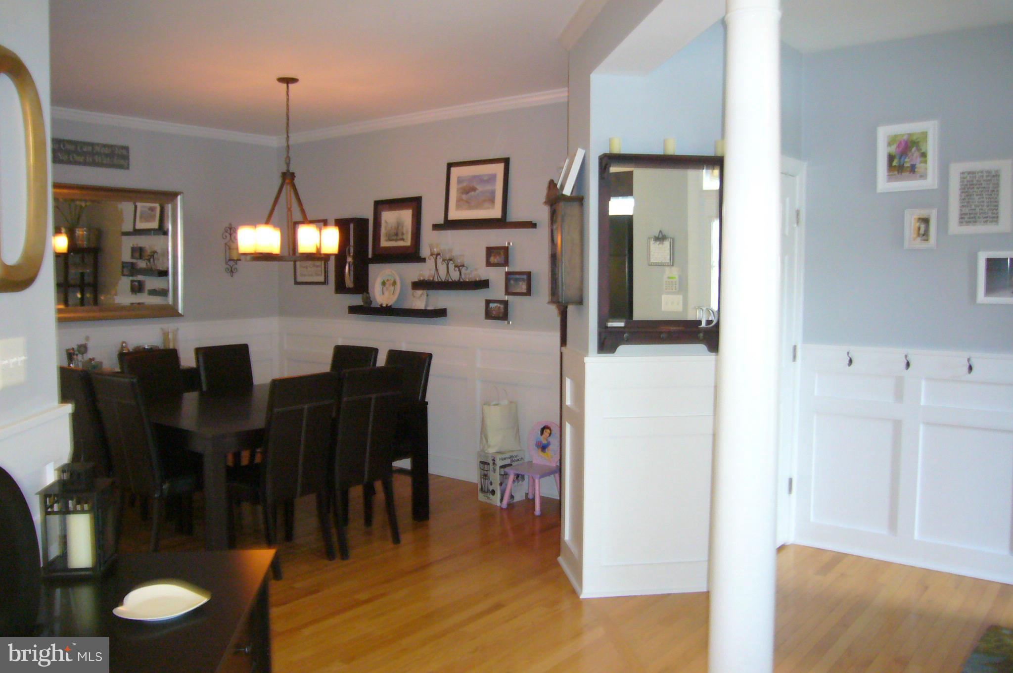 1620 Rising Ridge Road Mount Airy, MD 21771 - Photo 29 of 30 Open floor plan with decorator column and hardwood