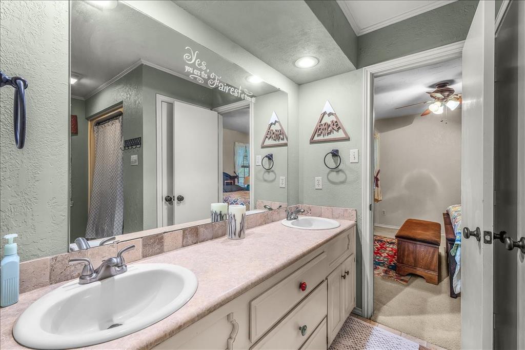 220 Annetta Road Willow Park, TX 76087 - Photo 19 of 40 a spacious bathroom with a double vanity sink mirror and double