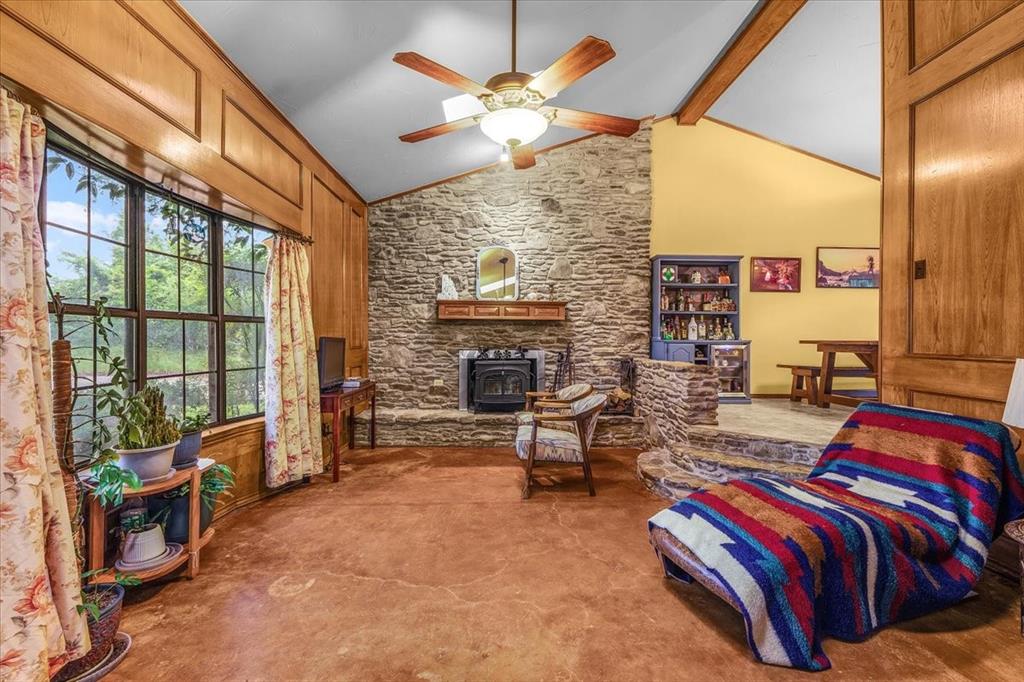 220 Annetta Road Willow Park, TX 76087 - Photo 20 of 40 a bedroom with furniture and a fireplace