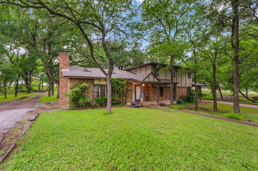 220 Annetta Road Willow Park, TX 76087 - Photo 2 of 40 front view of a house with a big yard