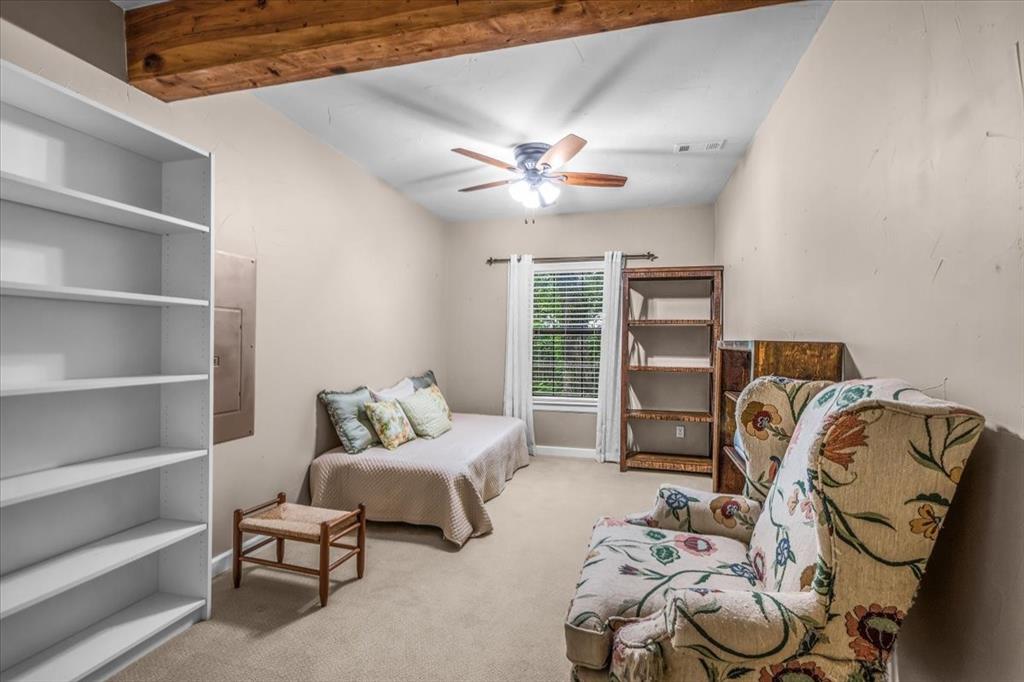 220 Annetta Road Willow Park, TX 76087 - Photo 25 of 40 a bedroom with a bed and a couch