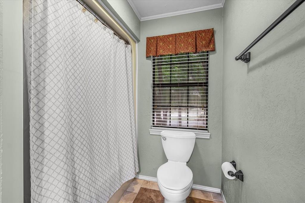 220 Annetta Road Willow Park, TX 76087 - Photo 29 of 40 a bathroom with a toilet and a sink
