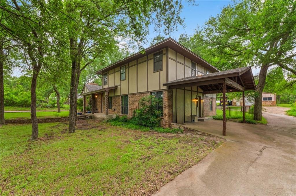 220 Annetta Road Willow Park, TX 76087 - Photo 3 of 40 a view of an house with backyard and a tree