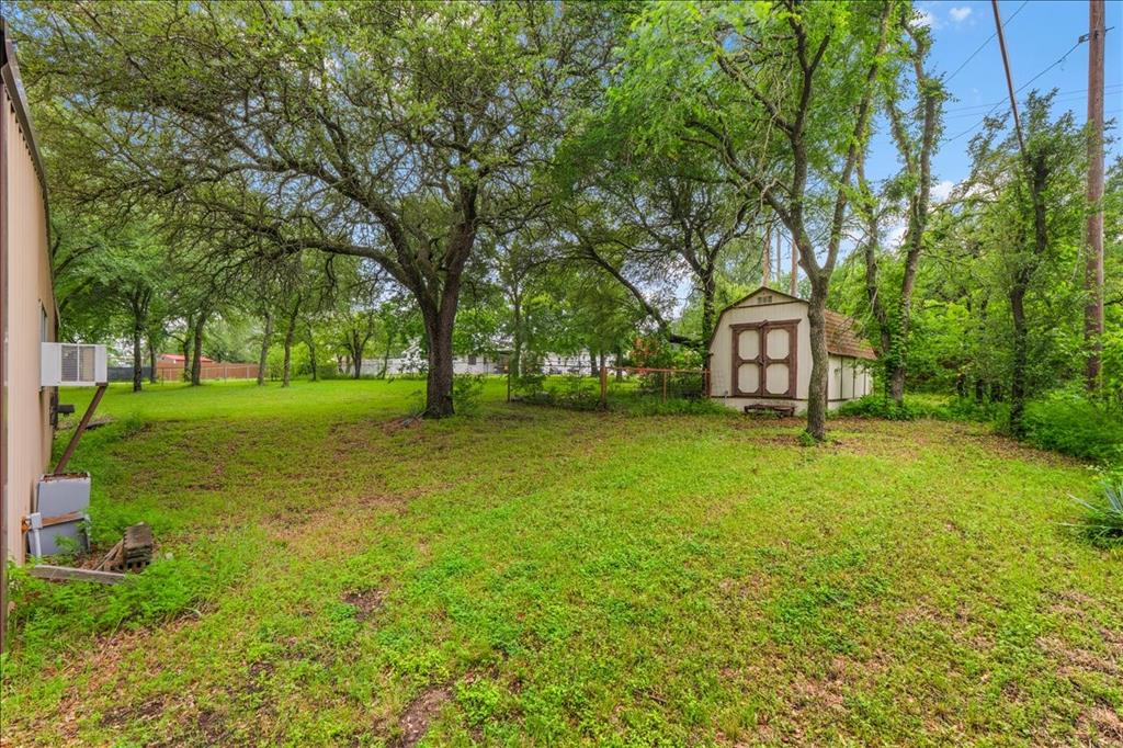 220 Annetta Road Willow Park, TX 76087 - Photo 35 of 40 a front view of a house with garden