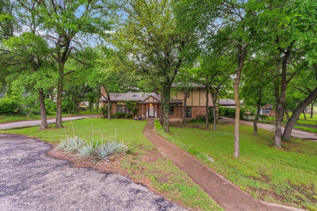 220 Annetta Road Willow Park, TX 76087 - Photo 5 of 40 a view of a house with backyard and a tree