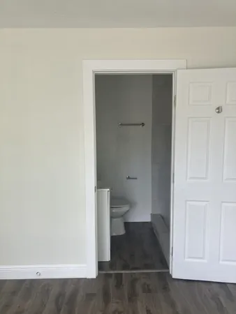 a view of a bathroom with a toilet