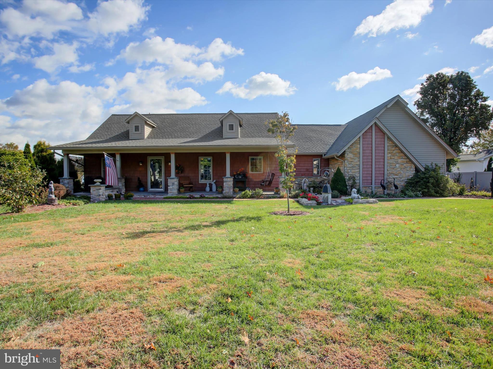 a front view of building with yard