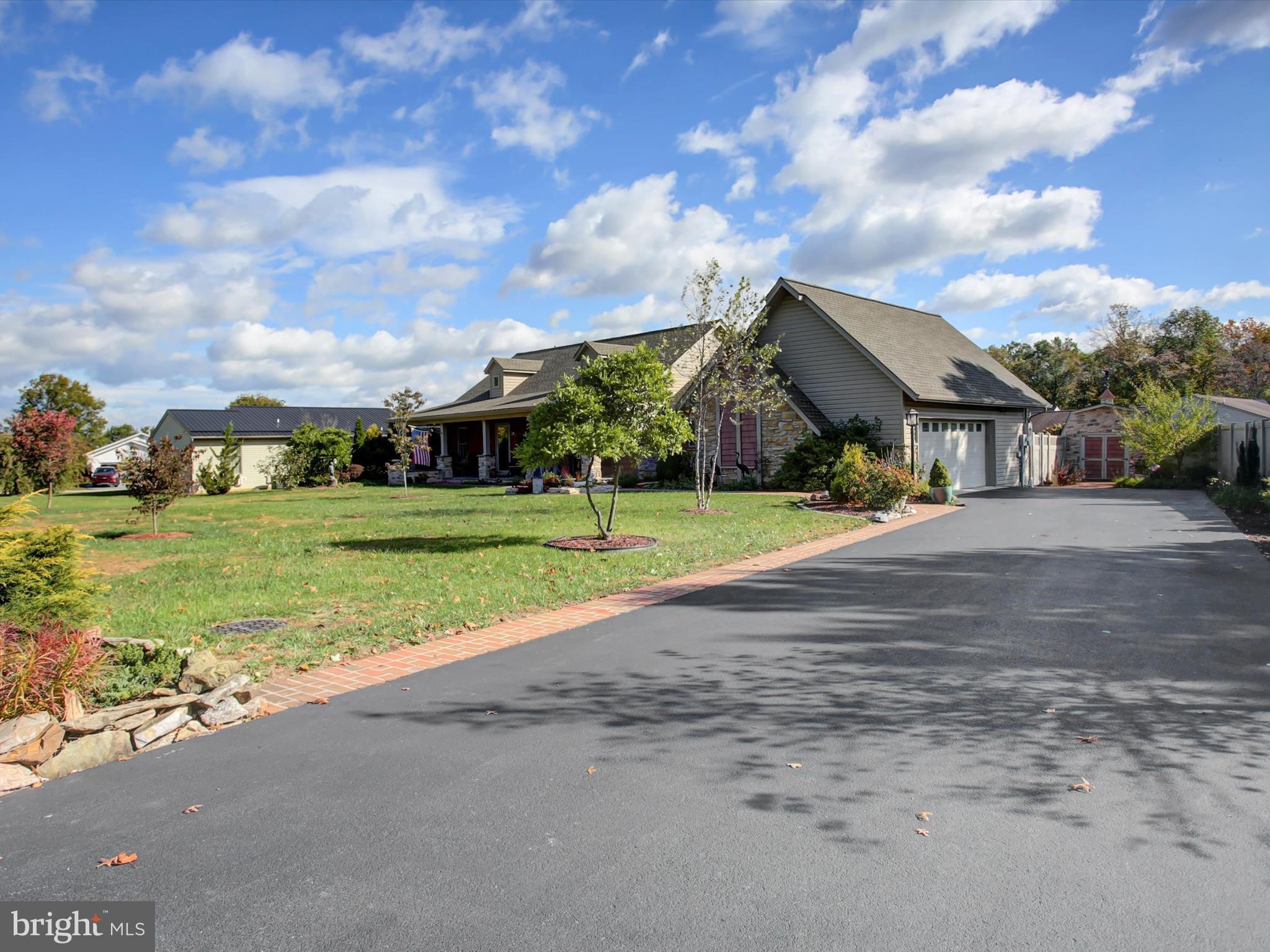 46 Pin Oak Lane Gettysburg, PA 17325 - Photo 3 of 54 a view of a house with a big yard and a large trees