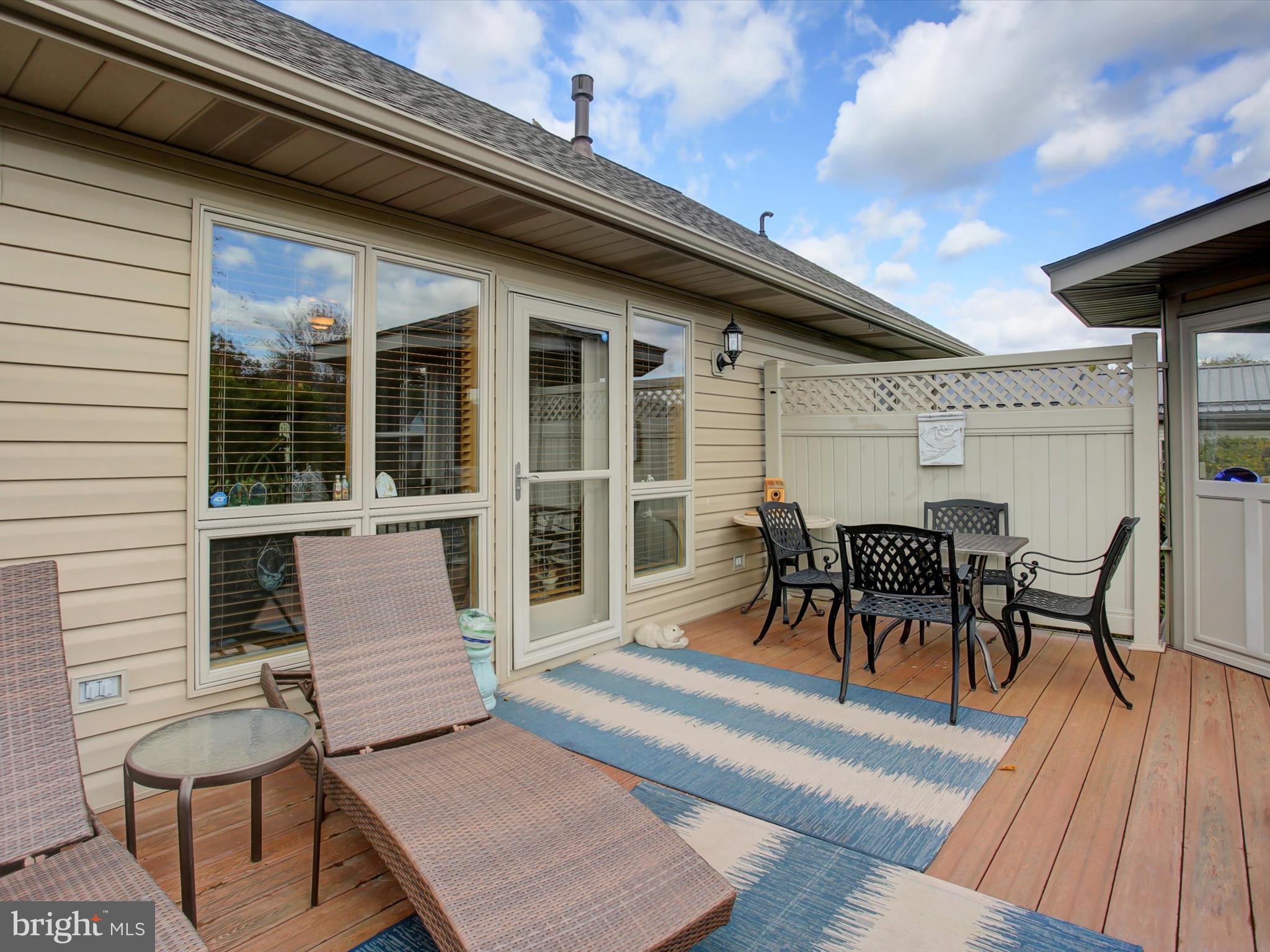 46 Pin Oak Lane Gettysburg, PA 17325 - Photo 39 of 54 a backyard of a house with table and chairs