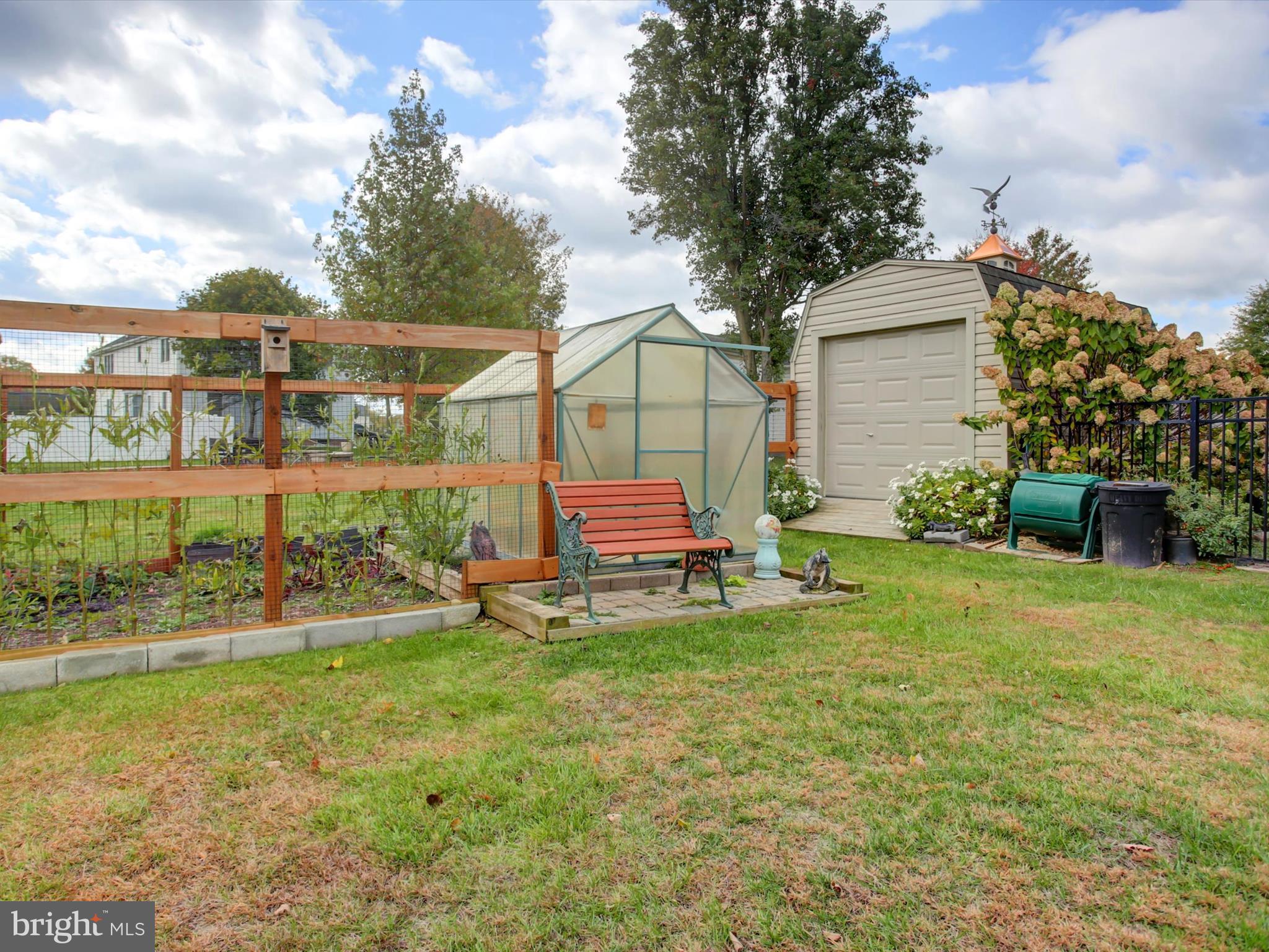 46 Pin Oak Lane Gettysburg, PA 17325 - Photo 45 of 54 a view of a house with a yard and sitting area