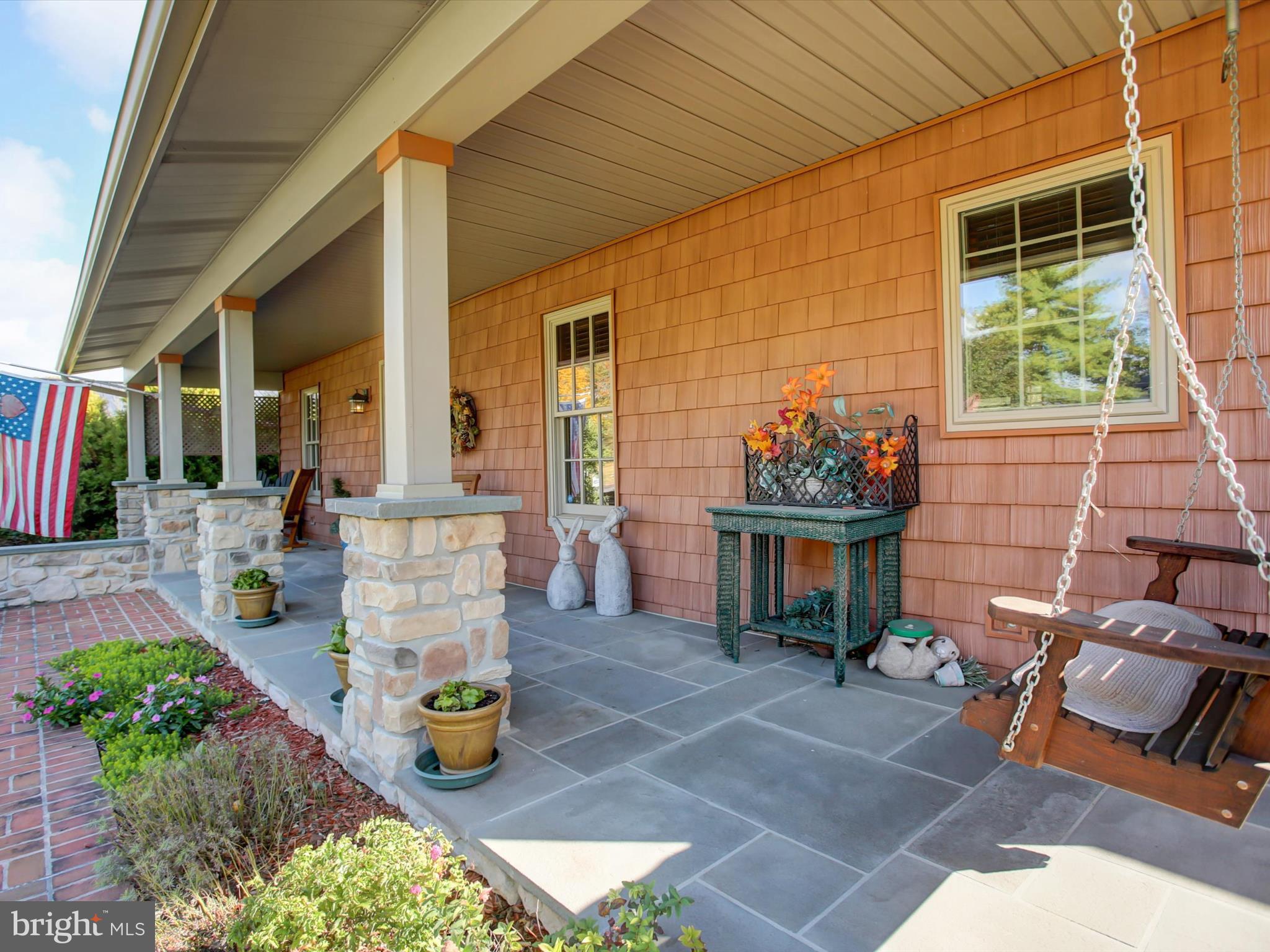 46 Pin Oak Lane Gettysburg, PA 17325 - Photo 5 of 54 a view of a patio with dining table and chairs and potted plants