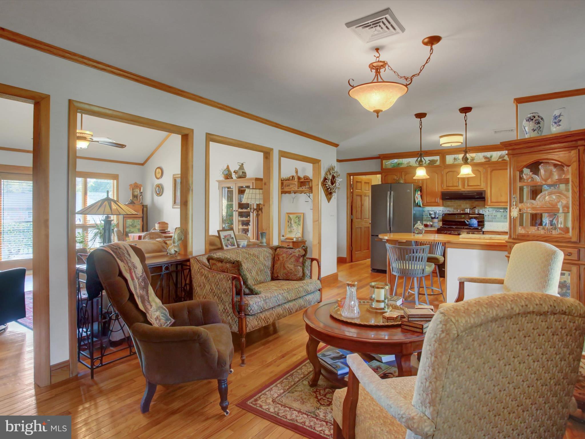 46 Pin Oak Lane Gettysburg, PA 17325 - Photo 8 of 54 a living room with furniture a chandelier and a large window