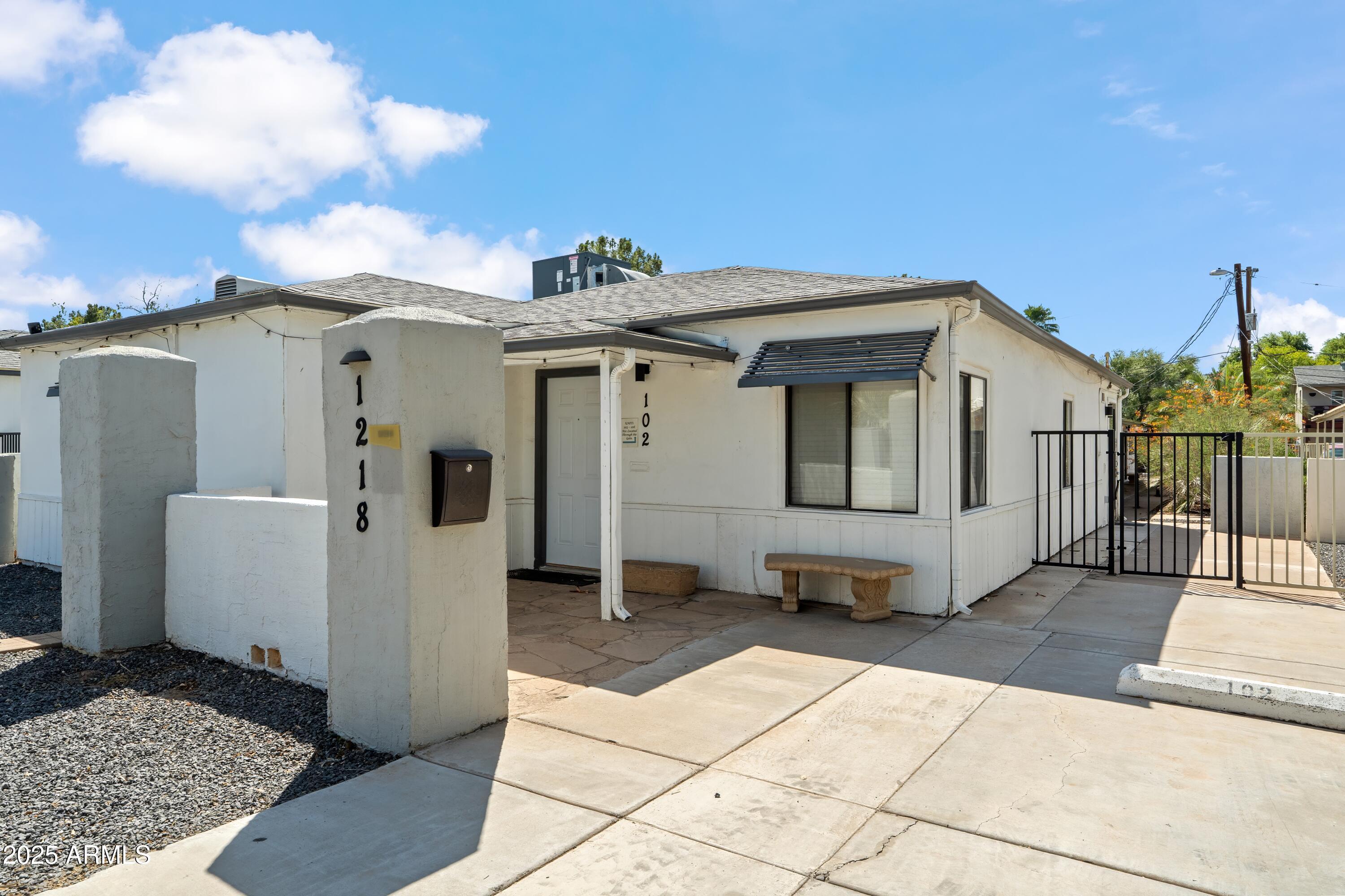 1218 South Farmer Avenue Tempe, AZ 85281 - Photo 16 of 47 a view of a house with backyard and utility