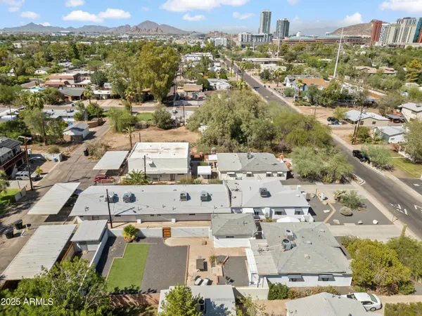 an aerial view of a city with lots of residential buildings