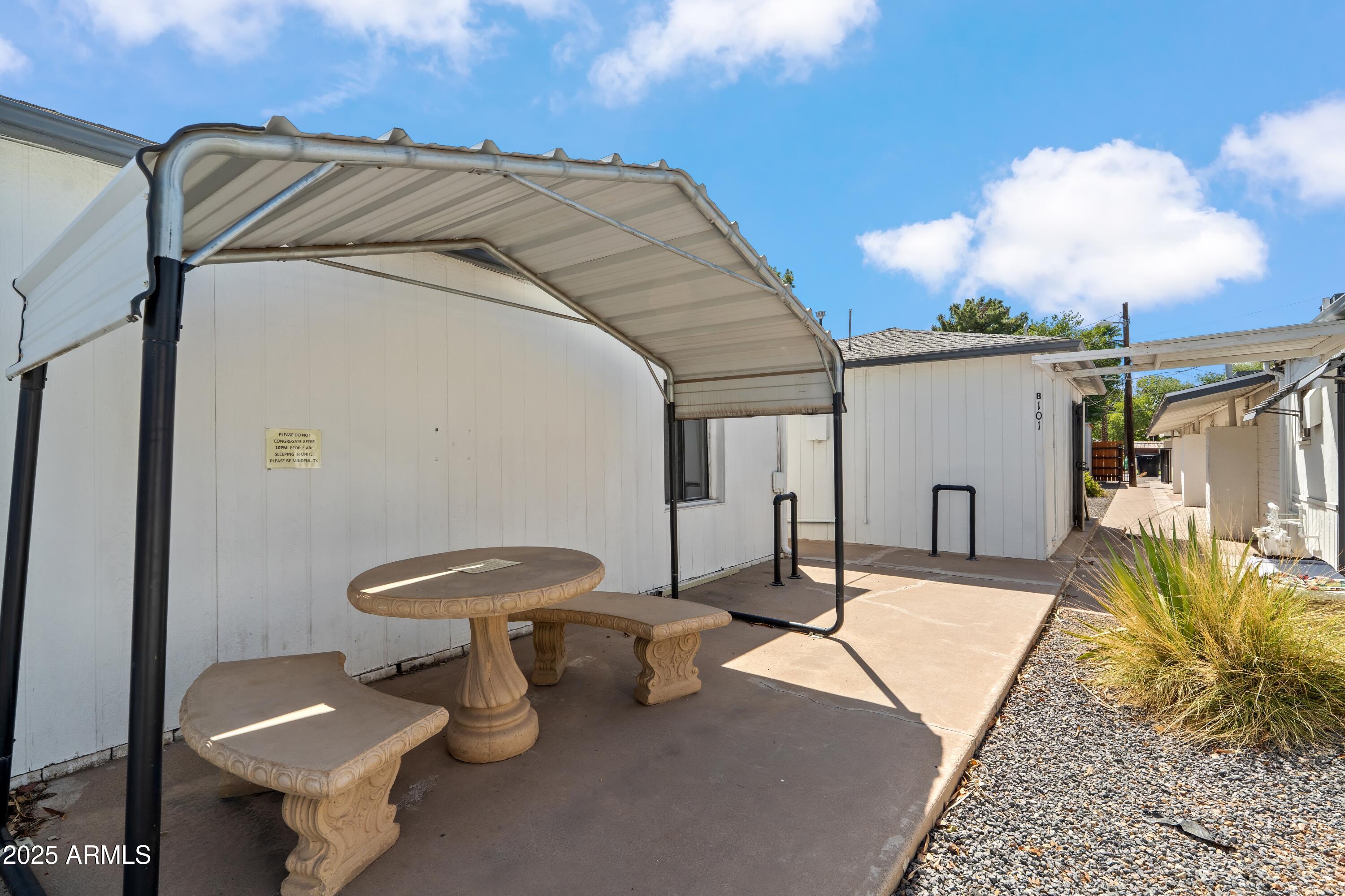 1218 South Farmer Avenue Tempe, AZ 85281 - Photo 26 of 47 a view of a patio with table and chairs