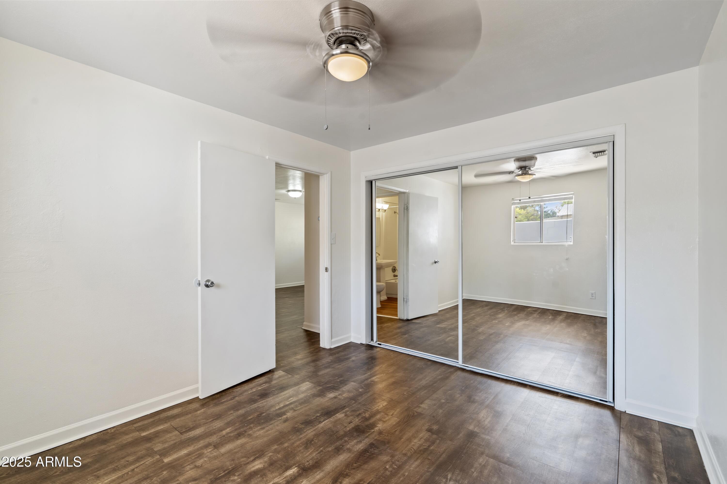 1218 South Farmer Avenue Tempe, AZ 85281 - Photo 34 of 47 wooden floor in an empty room with a window