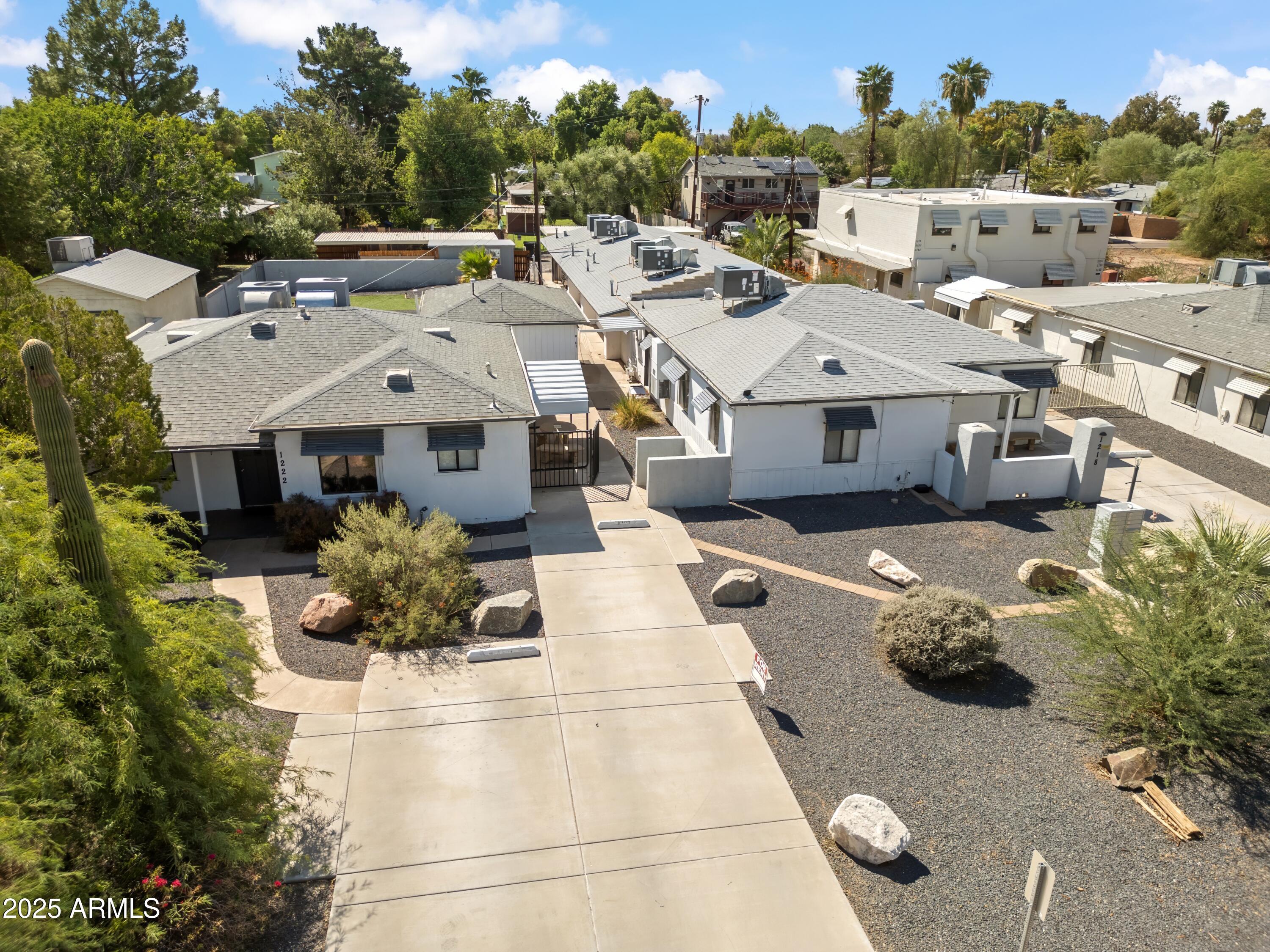 1218 South Farmer Avenue Tempe, AZ 85281 - Photo 6 of 47 a aerial view of a house with a yard and potted plants