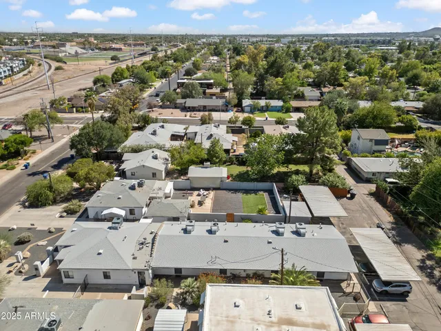 an aerial view of a city with lots of residential buildings