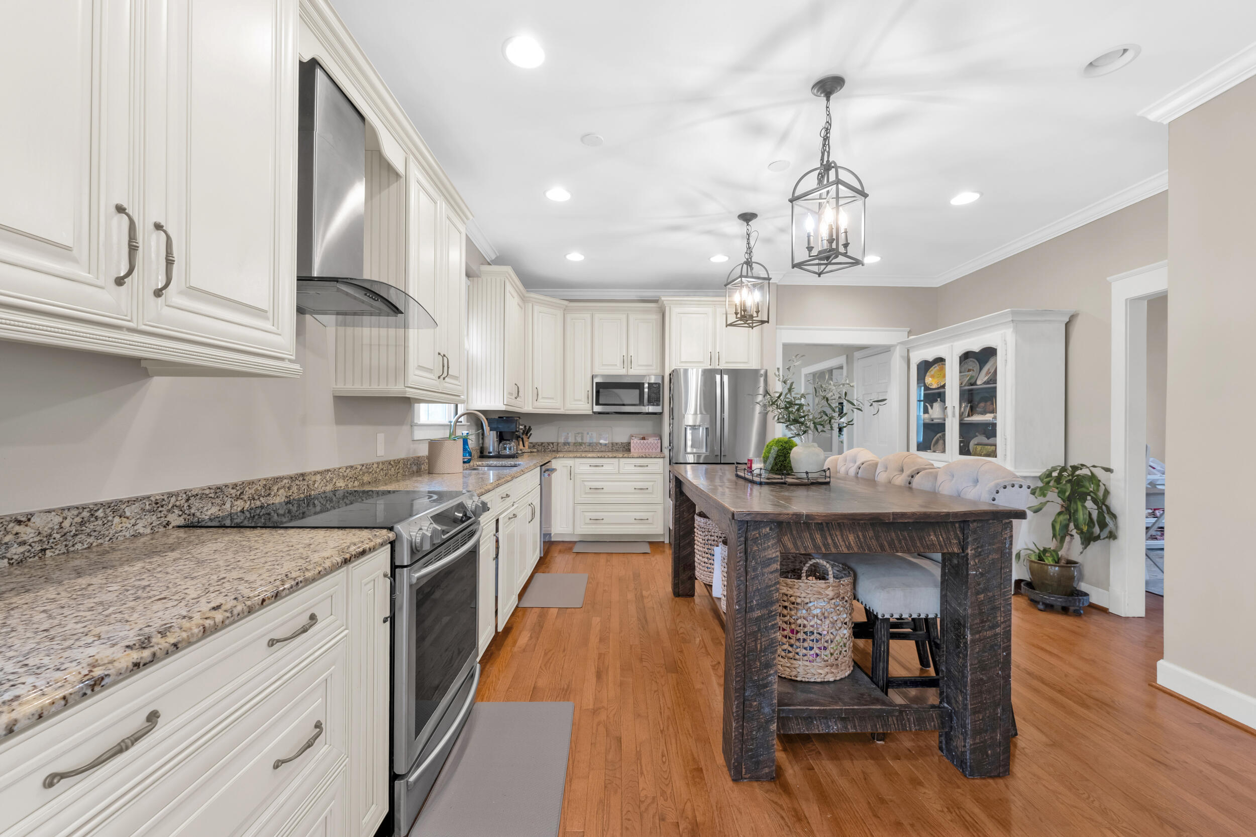 3159 Twin Pine Road Thomson, GA 30824 - Photo 13 of 36 Granite counter tops with hardwood floors and stainless appliances