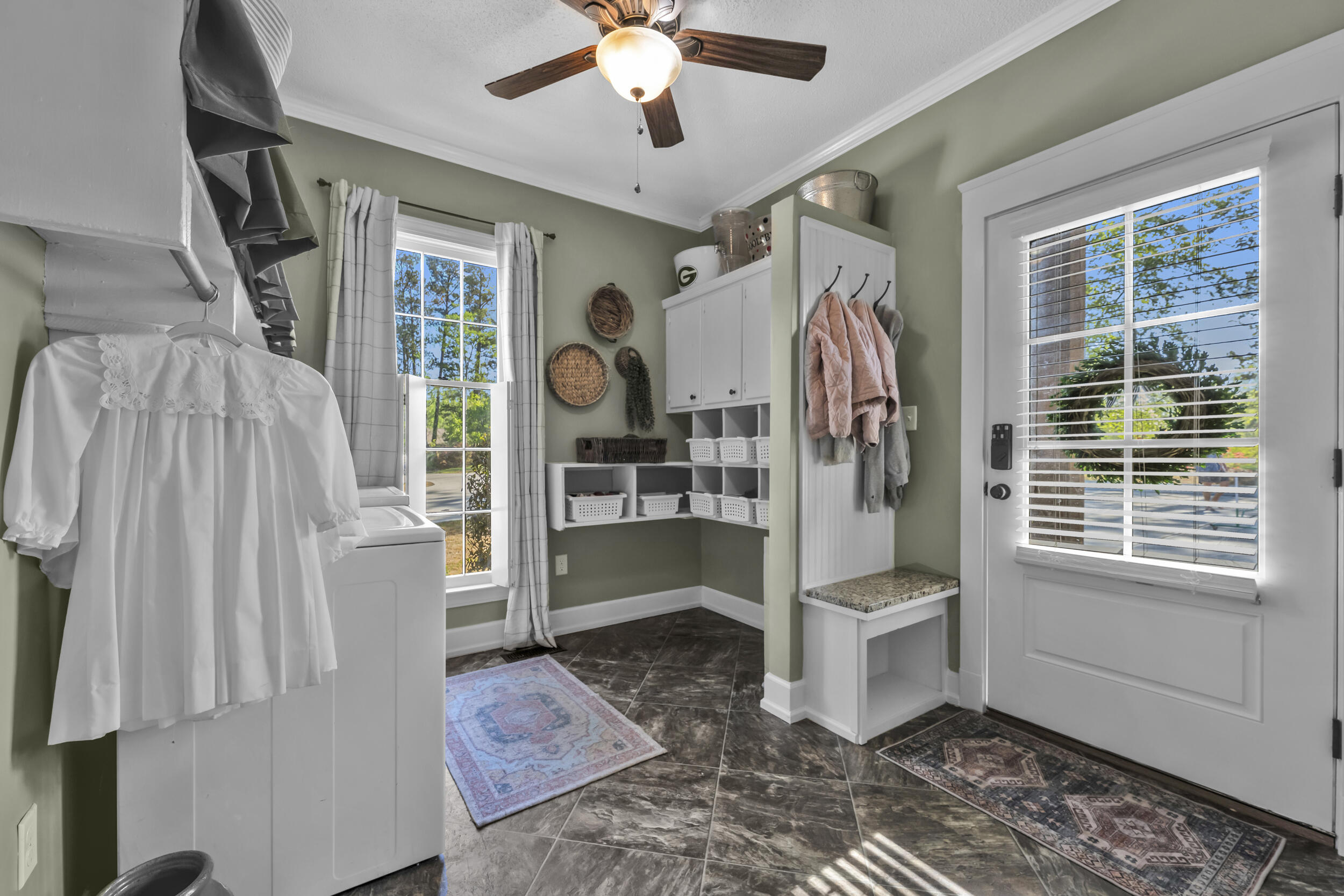 3159 Twin Pine Road Thomson, GA 30824 - Photo 16 of 36 Mud Room Entry / Laundry room for washer dryer activity and built in storage, granite top bench detail