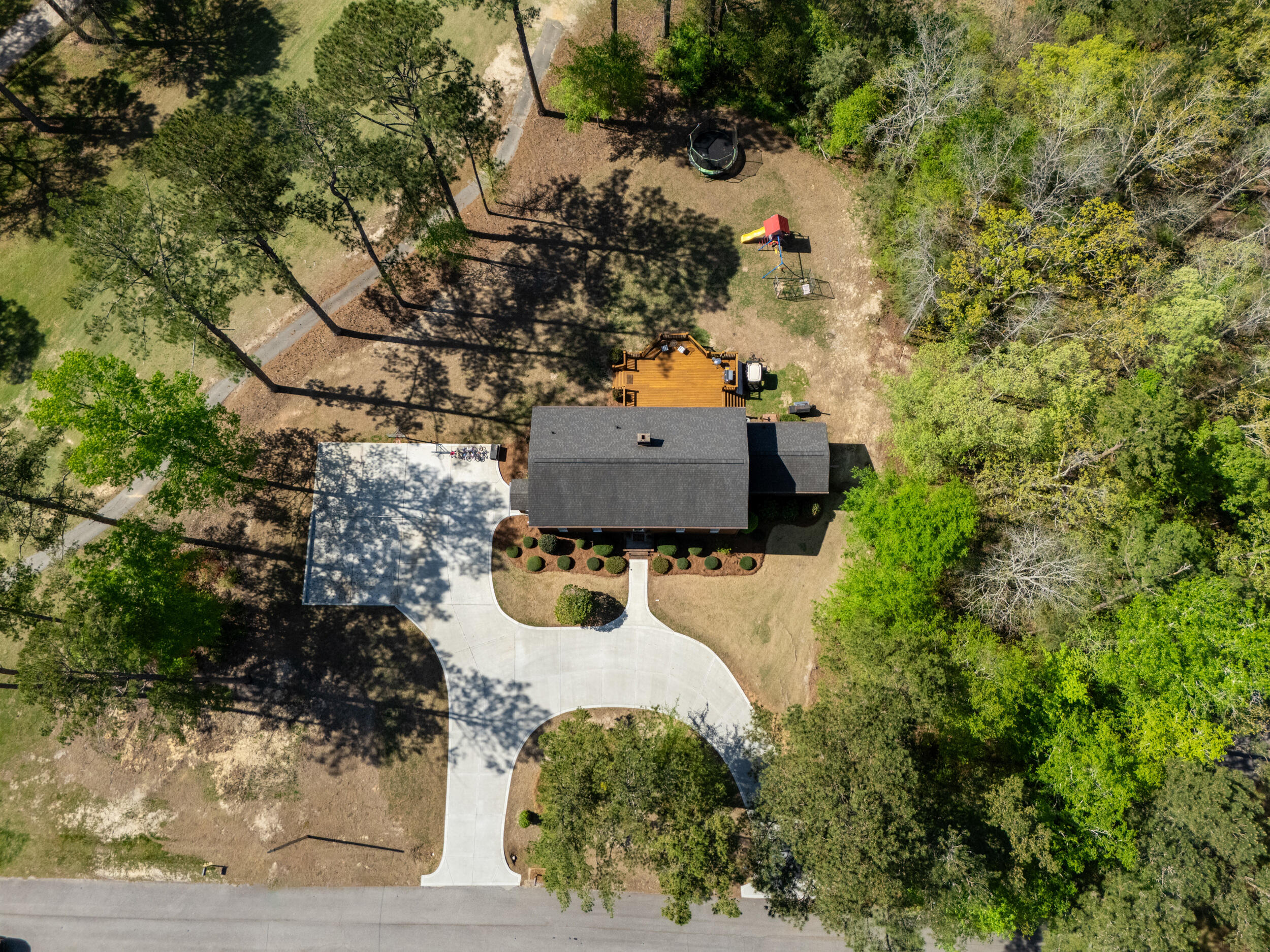 3159 Twin Pine Road Thomson, GA 30824 - Photo 4 of 36 Ample parking and vehicle entry, large paved square for kids activities, pickleball, basketball and roller sports