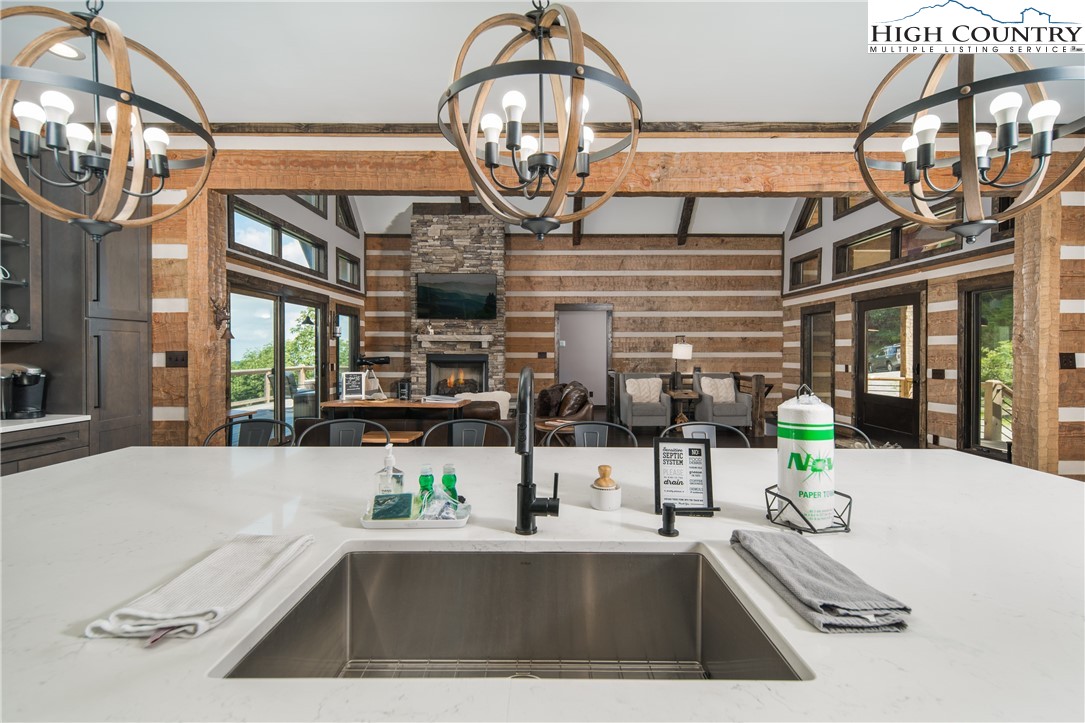 351 Broken Arrow Trail Boone, NC 28607 - Photo 16 of 48 a kitchen view with a sink and a mirror
