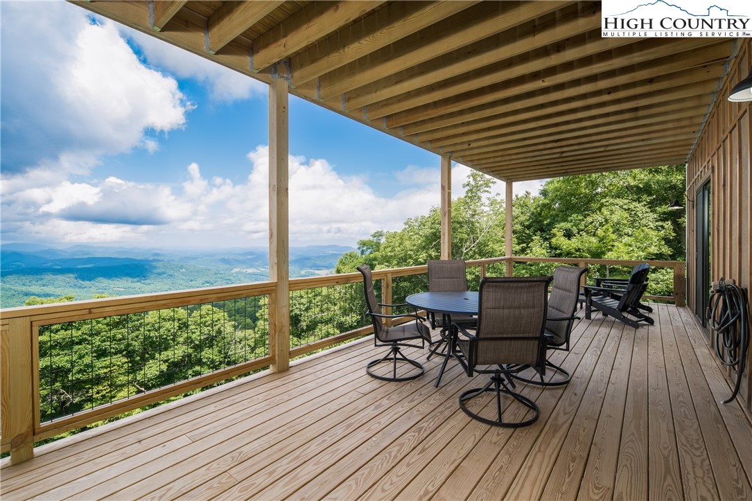 351 Broken Arrow Trail Boone, NC 28607 - Photo 2 of 48 a view of porch with seating space