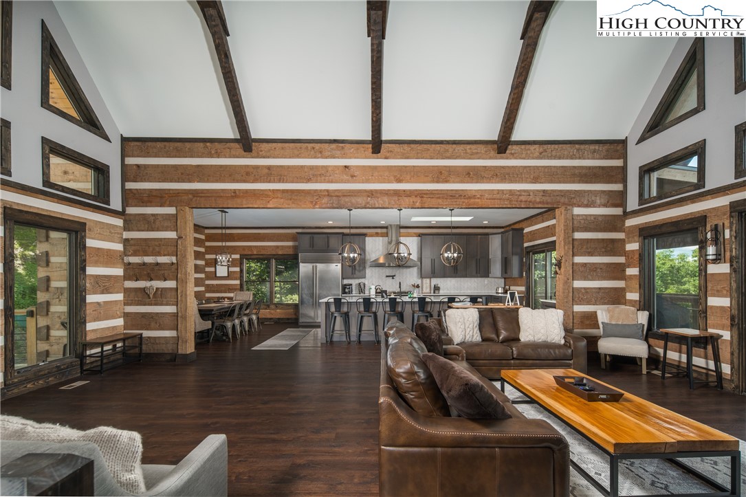 351 Broken Arrow Trail Boone, NC 28607 - Photo 21 of 48 a living room with furniture and wooden floor