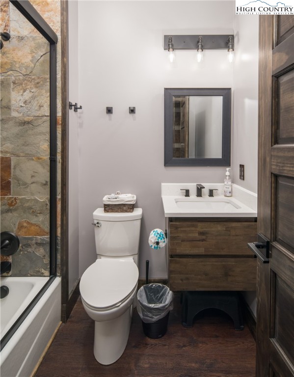 351 Broken Arrow Trail Boone, NC 28607 - Photo 25 of 48 a bathroom with a toilet sink and mirror
