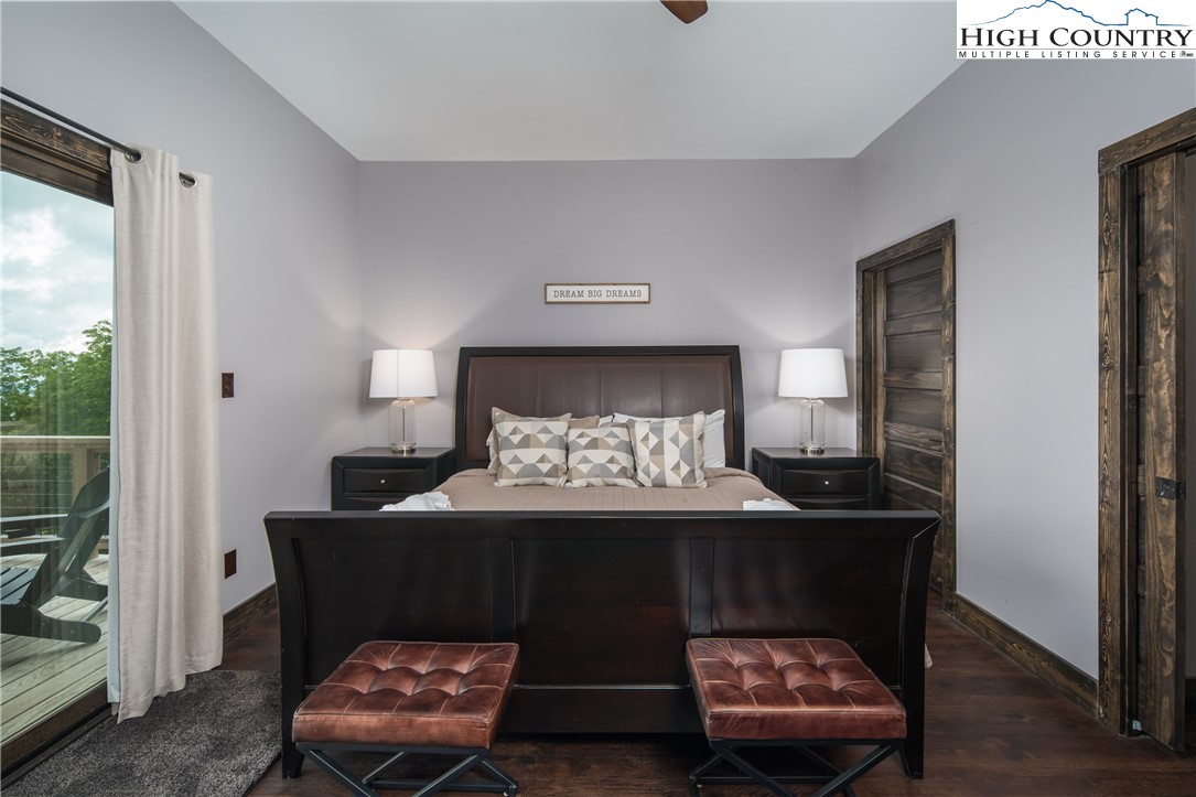 351 Broken Arrow Trail Boone, NC 28607 - Photo 29 of 48 a living room with furniture and a lamp