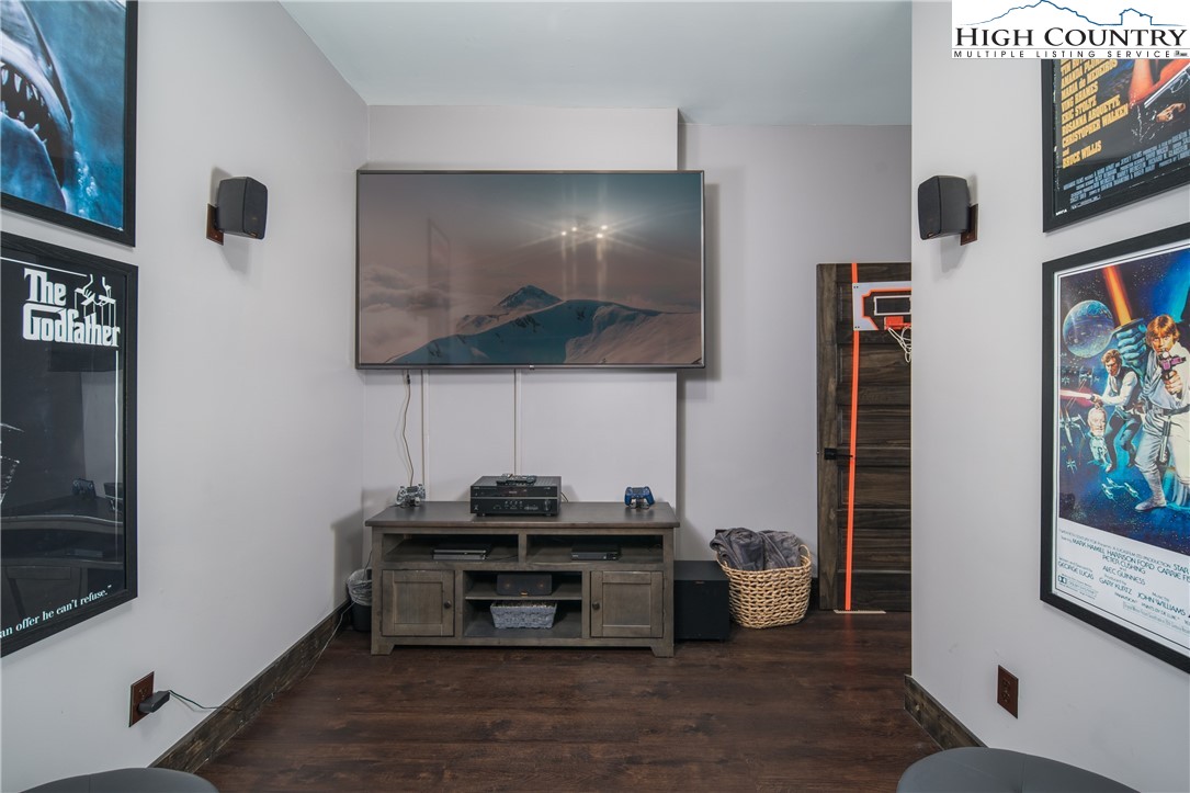 351 Broken Arrow Trail Boone, NC 28607 - Photo 34 of 48 a room with furniture and wooden floor