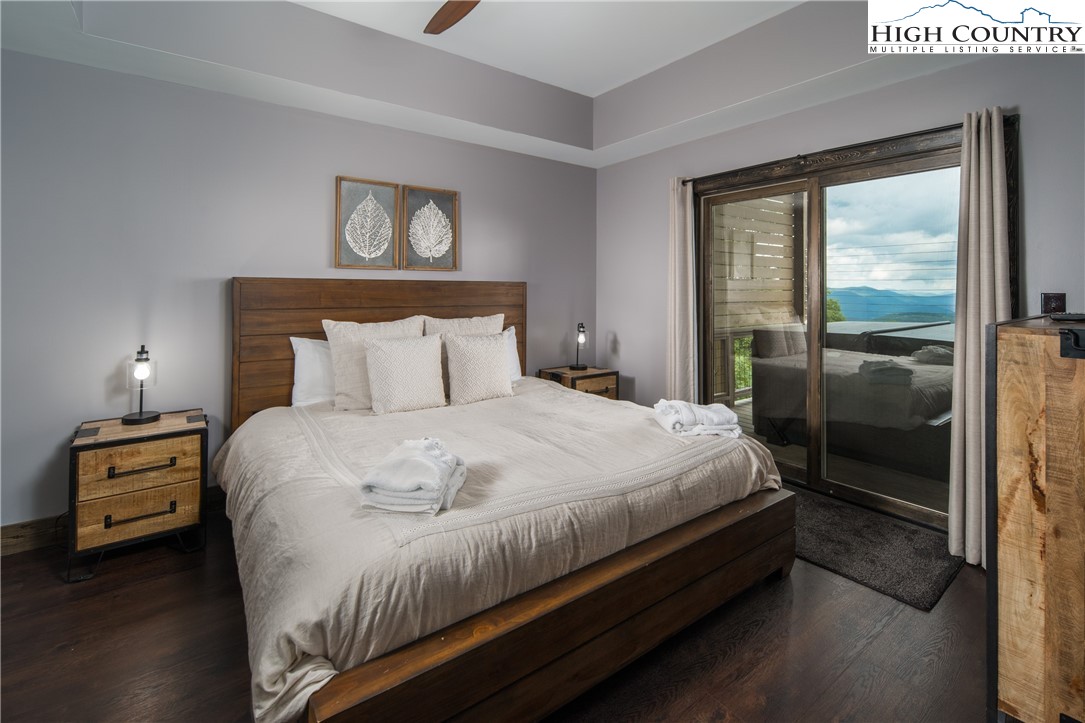 351 Broken Arrow Trail Boone, NC 28607 - Photo 35 of 48 a bedroom with a bed and a window