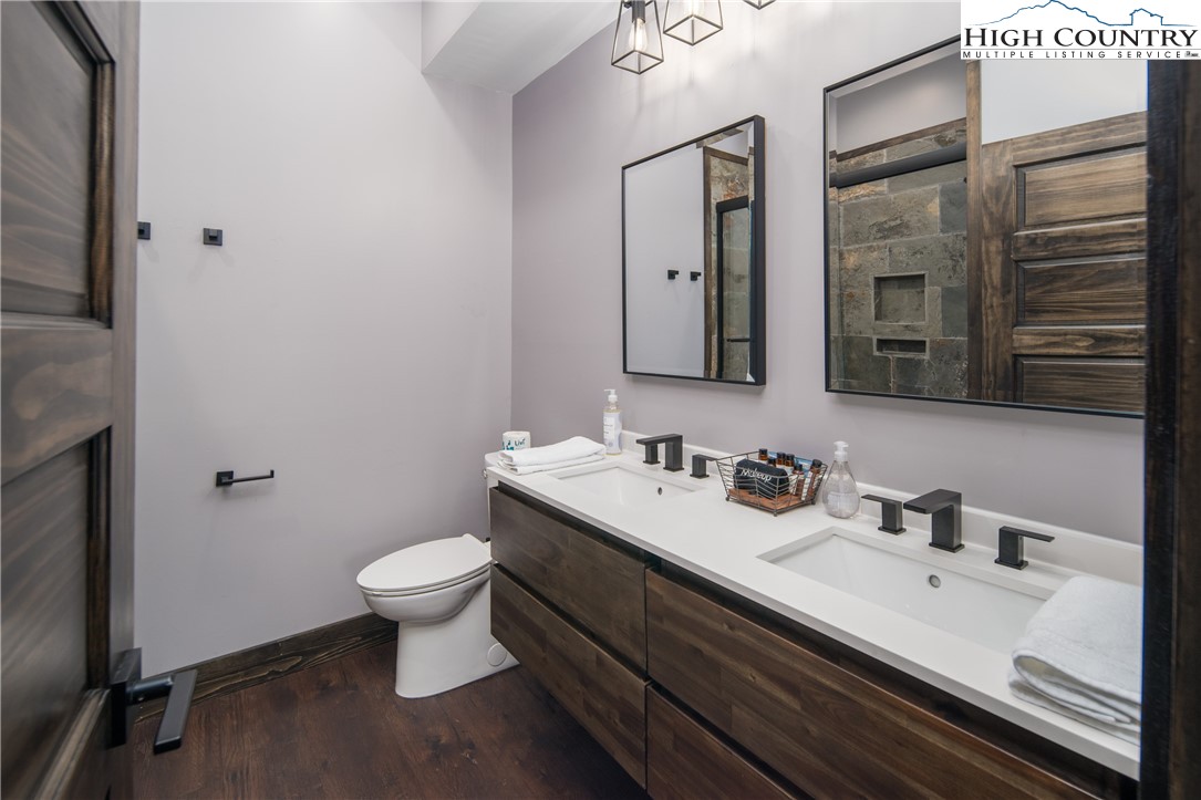 351 Broken Arrow Trail Boone, NC 28607 - Photo 37 of 48 a bathroom with a sink and a toilet