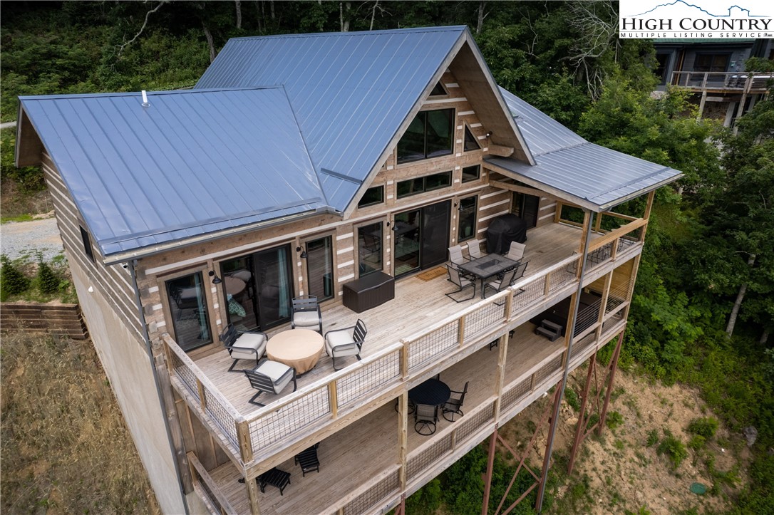 351 Broken Arrow Trail Boone, NC 28607 - Photo 48 of 48 a aerial view of a house with roof deck and barbeque oven