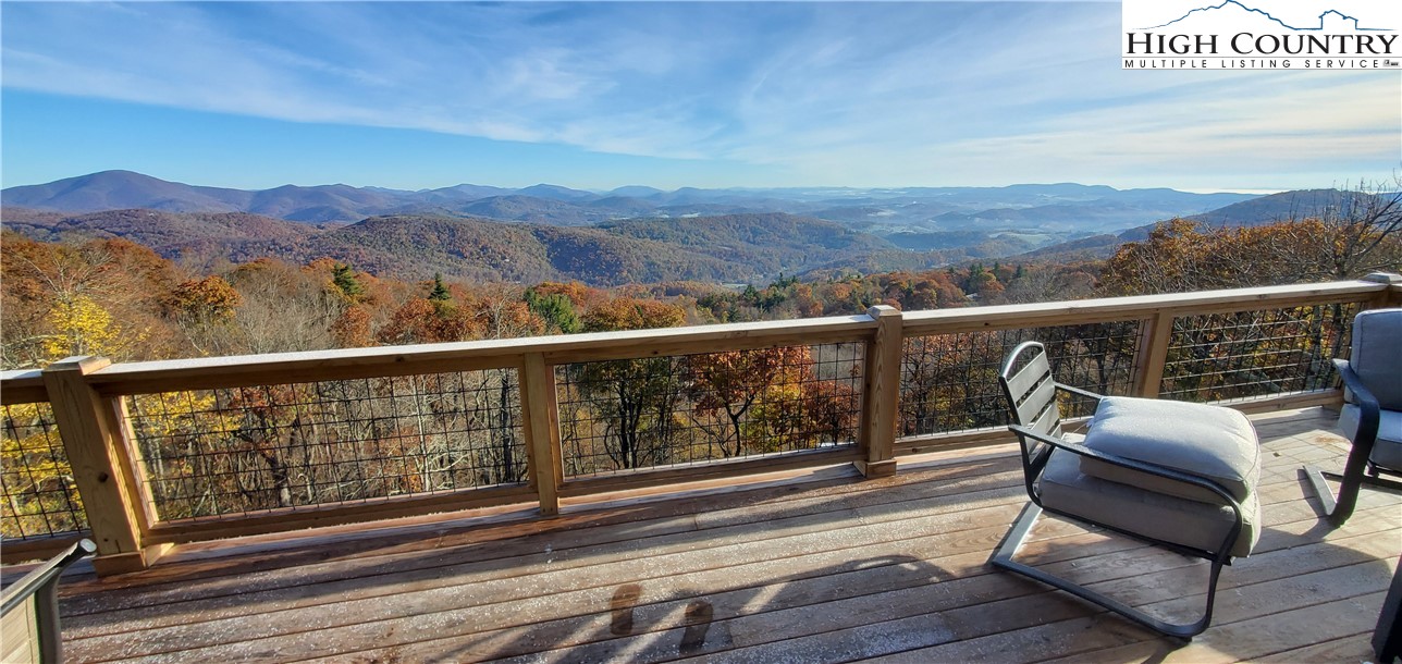 351 Broken Arrow Trail Boone, NC 28607 - Photo 6 of 48 a view of balcony with furniture and wooden floor