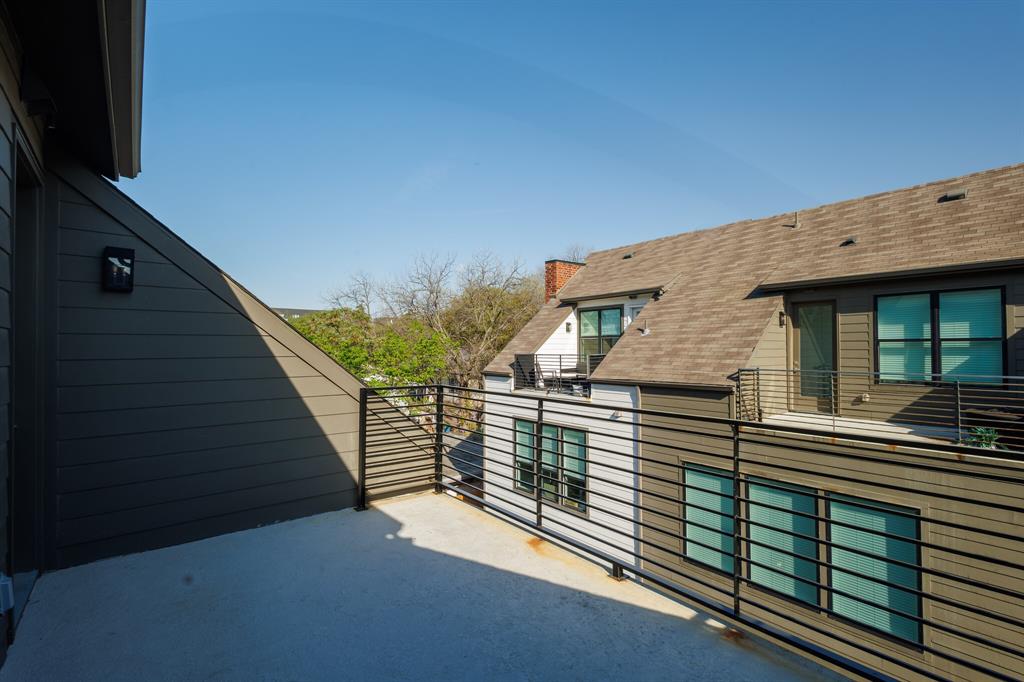 114 Chester Court Dallas, TX 75203 - Photo 29 of 31 a view of a balcony with two chairs